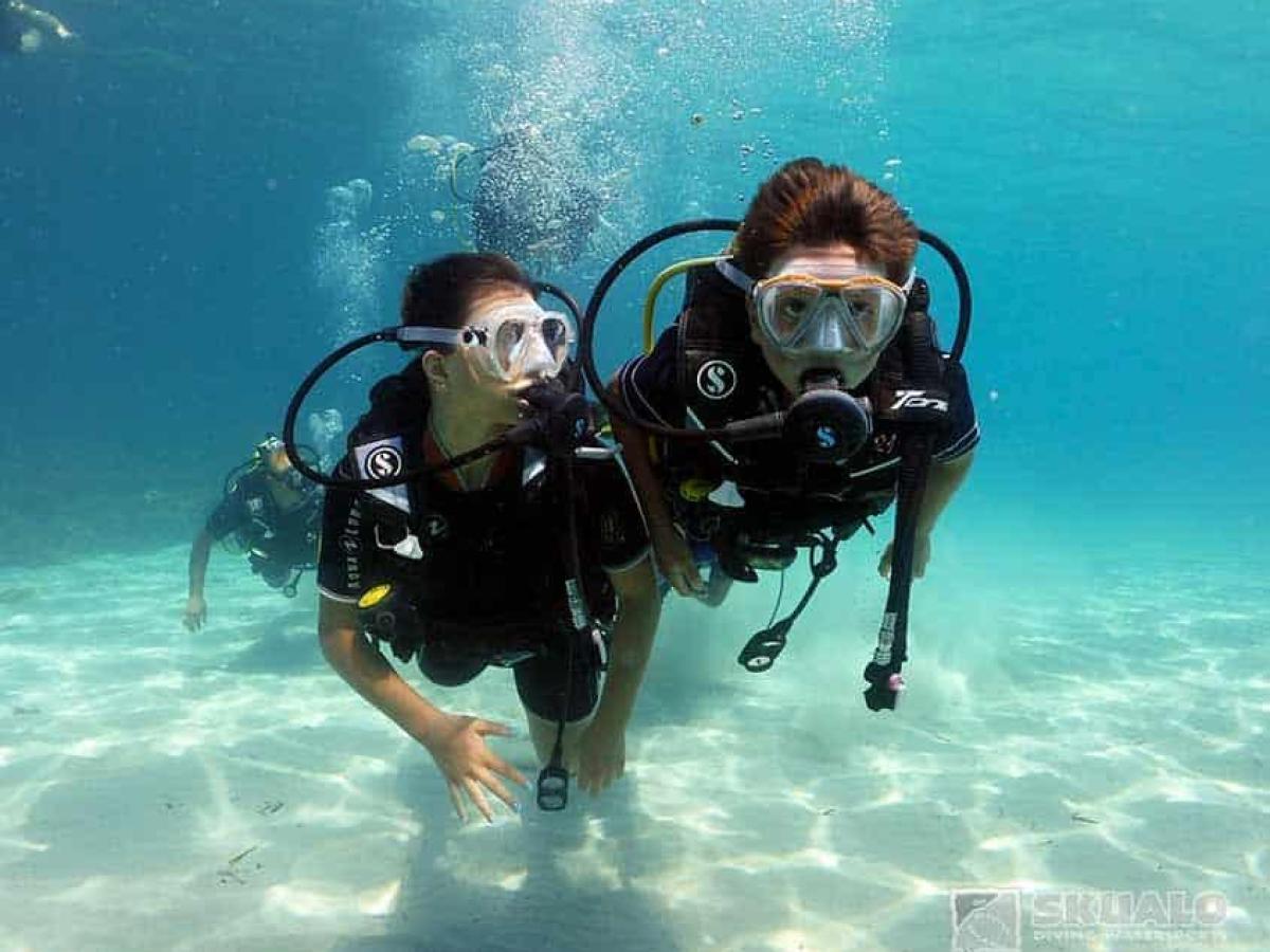 a person swimming in a body of water